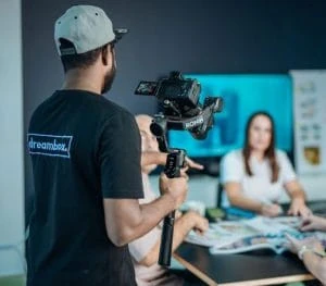 Dreambox crew setting up lighting on a studio shoot in Dubai